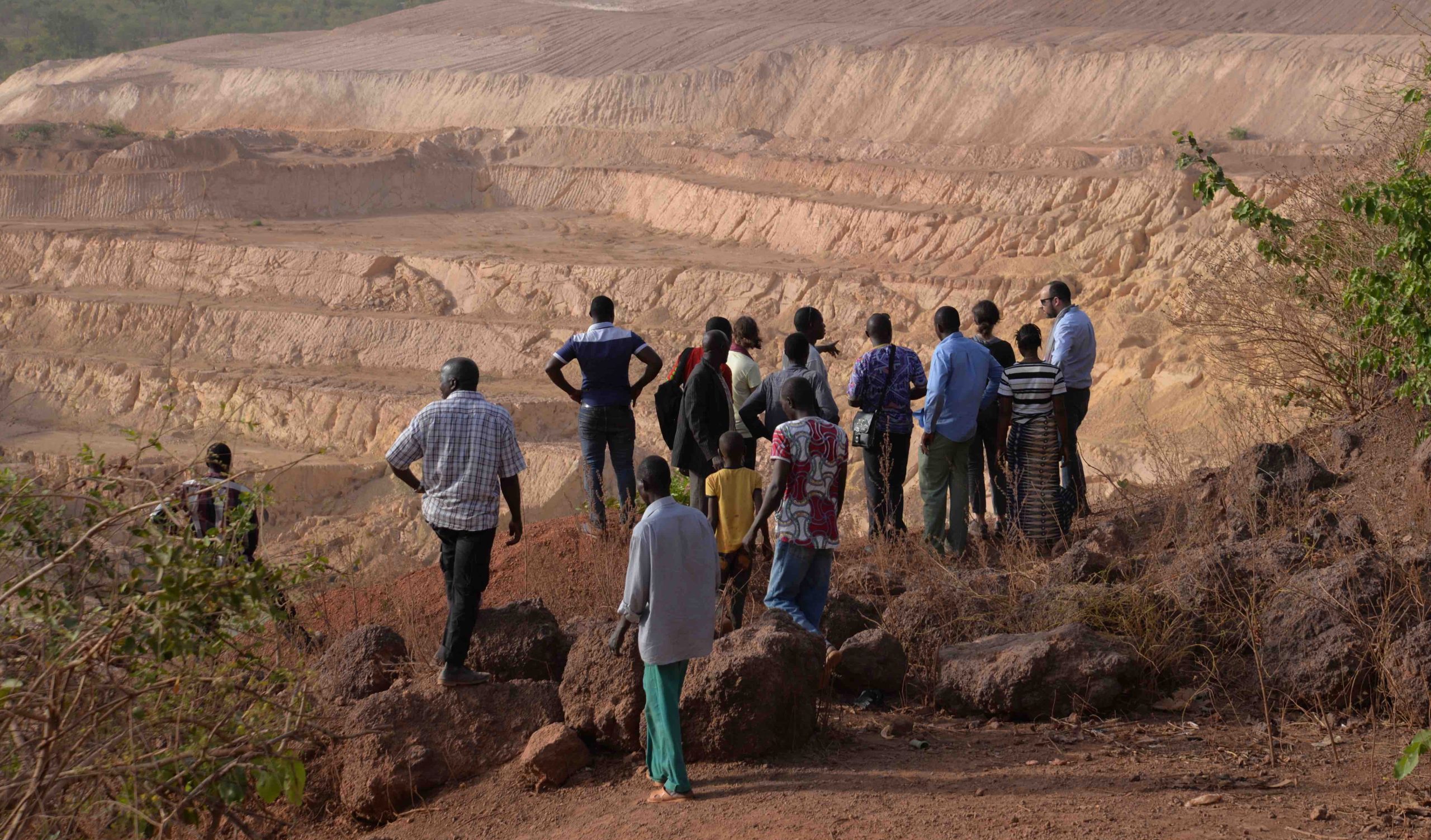 Overlooking the first AngloGold Ashanti mine in the Siguiri region of Guinea. Approximately 380 households were forcibly evicted from their ancestral land to make way for the open-pit oxide goldmine. Click on the photo for more information. (Photo: Inclusive Development International)